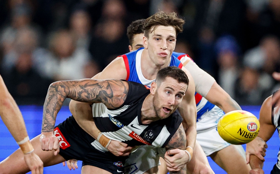 Harvey Gallagher tackles Jeremy Howe during the R12 match between Western Bulldogs and Collingwood at the MCG on May 31, 2024. Picture: AFL Photos